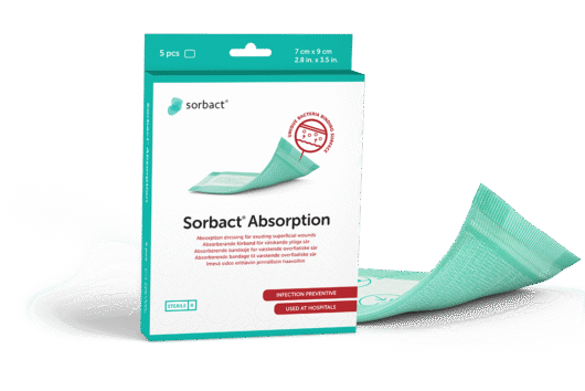 Sorbact Absorption -pakkauksen ja sidoksen vieressä.