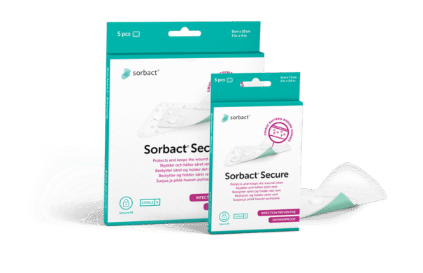 Sorbact Secure -pakkauksia ja sidos vieressä.